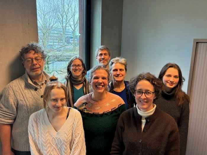 Group portrait of Board of Studies members at AUC academic building