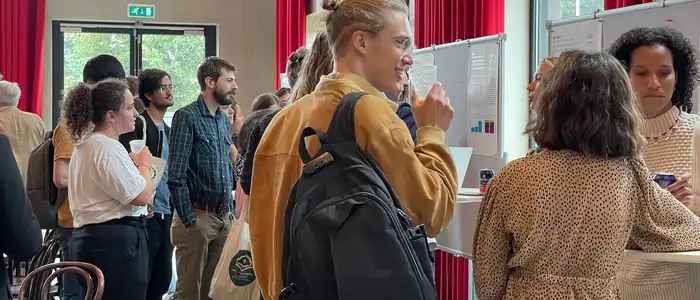 Capstone Forum, discussing poster projects